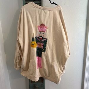 QUEEN OF SPARKLES Beige Sweater with Pink and Gold Nutcracker